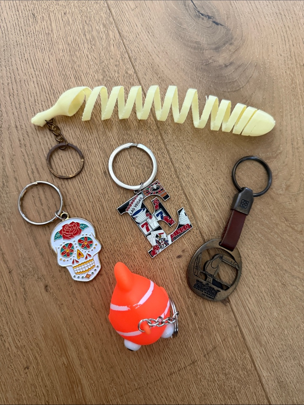 Assorted Keychain Lot with Neon Orange Squishy Fish and Novelty Charms